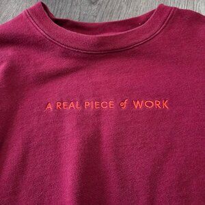 The Wing 'A Real Piece of Work' Maroon Crewneck